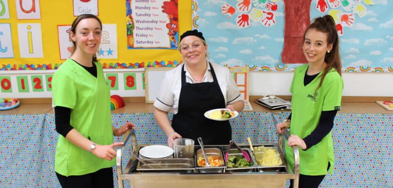 school food service trolley with chef and two servers
